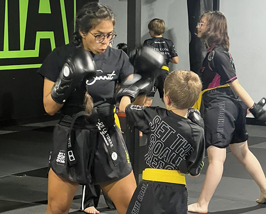 at-he-summit-img Small kid taking a martial arts class